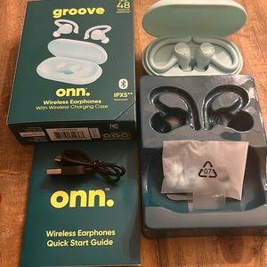 Wireless earphones with wireless charging case